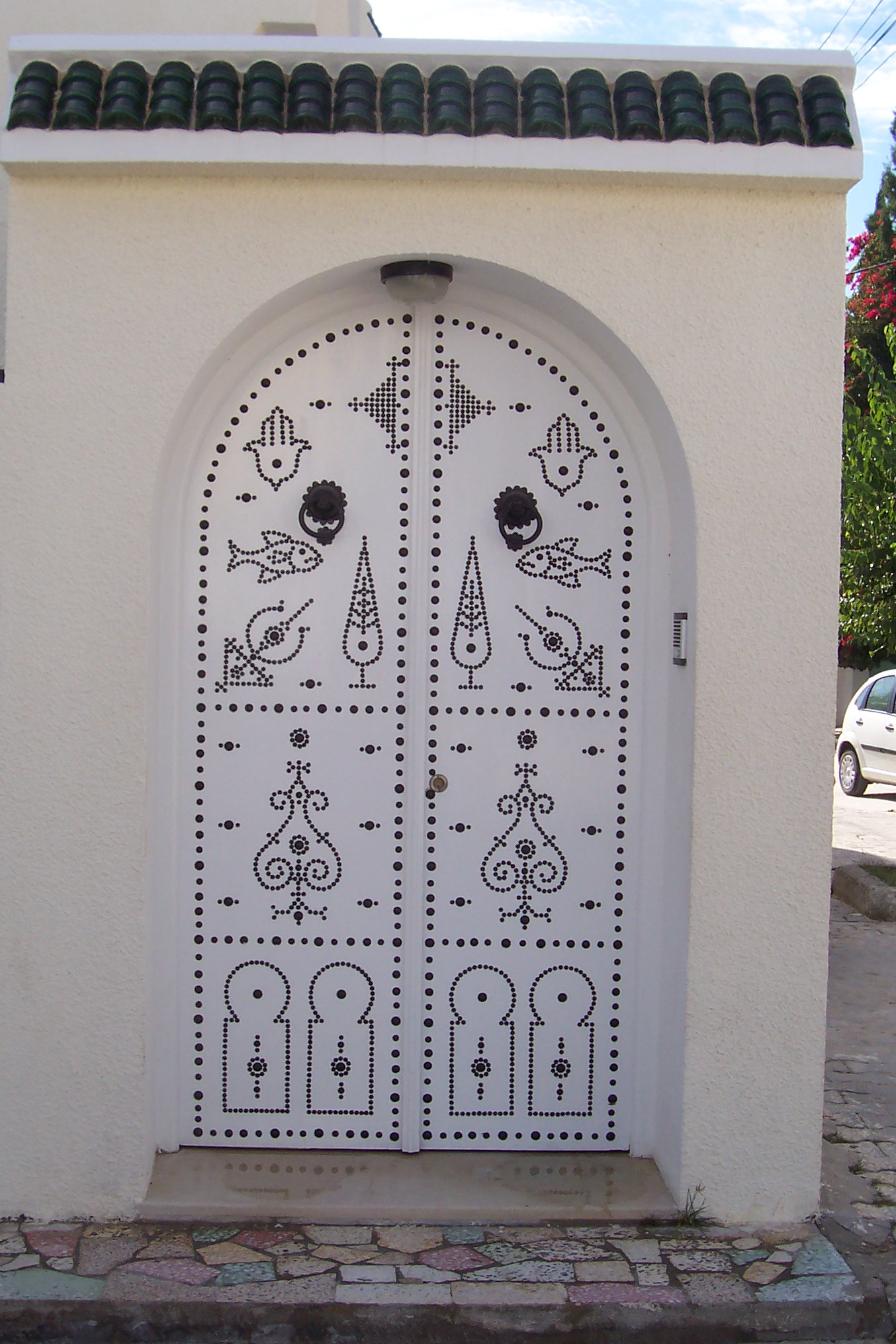 janneke decorated door perforated holes