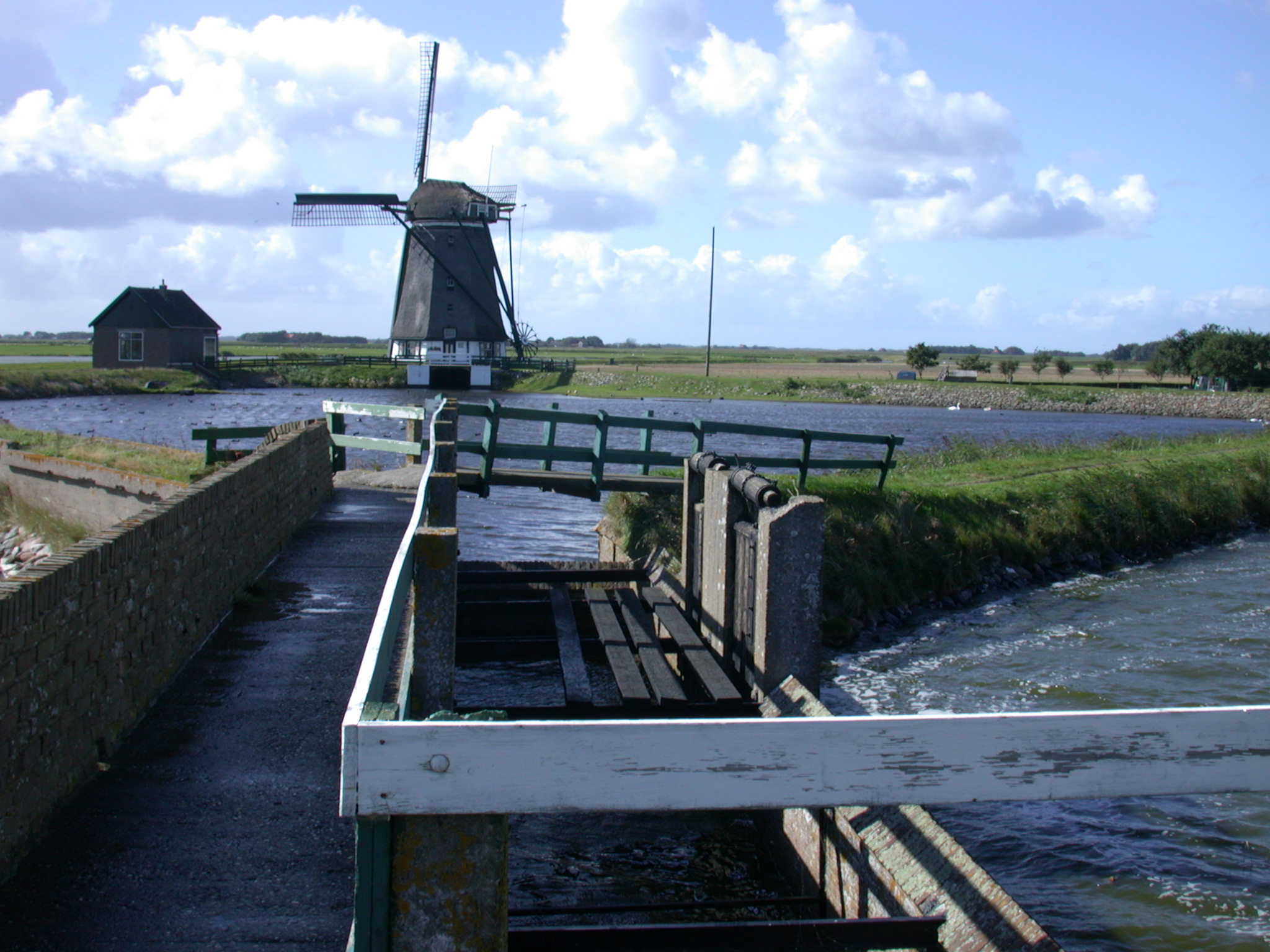 nature landscapes texel polder het noorden mill windmill de eendracht eendracht sluis architecture exteriors holland bridge footbridge