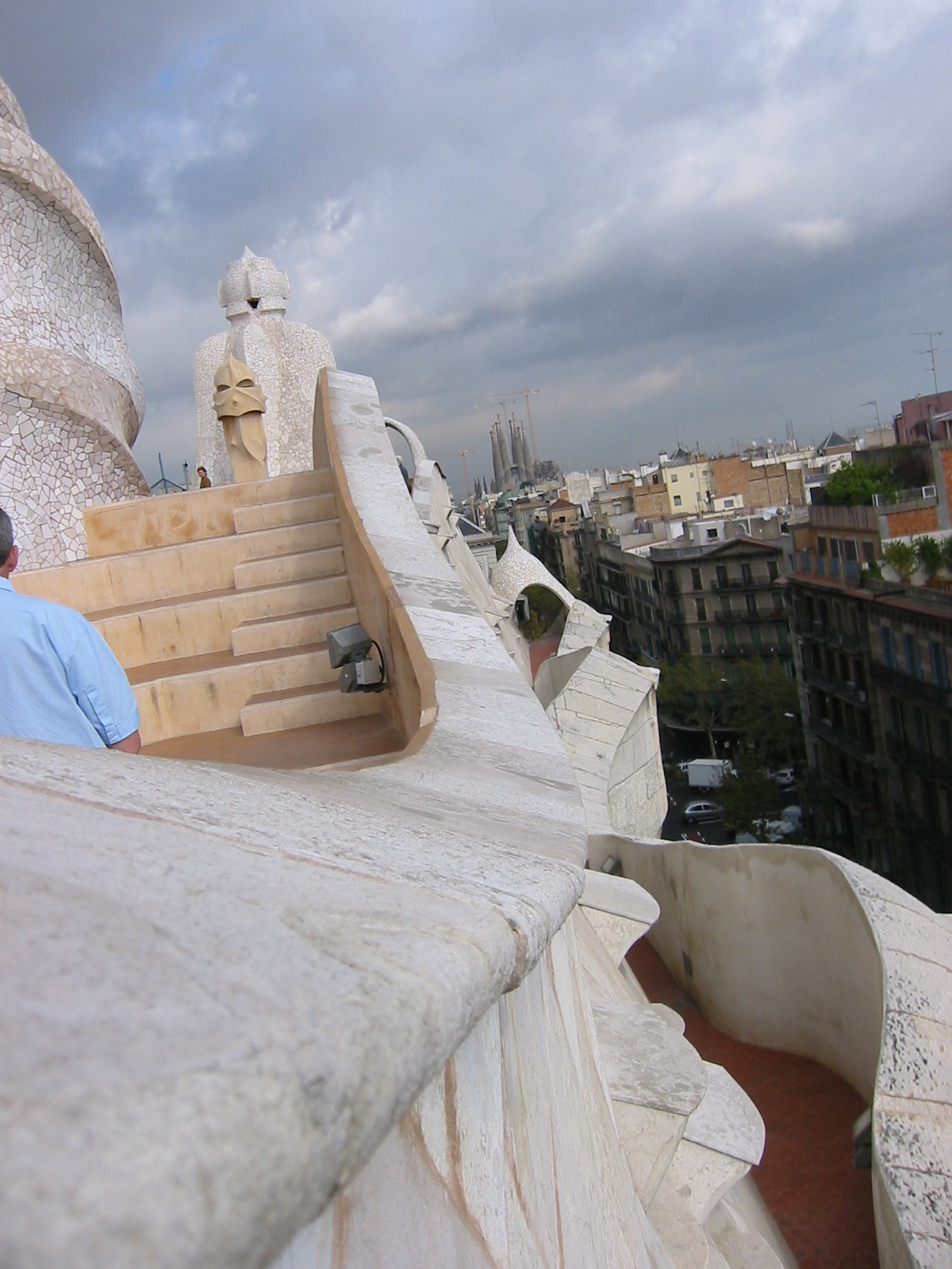 city rooftops buildings streets down below italian barcelona spain gaudi la sagrada familia la pedrera